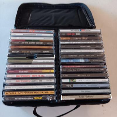 MUSIC ON CD's IN A CARRY CASE PLUS JOHN DENVER 4 DISC SET