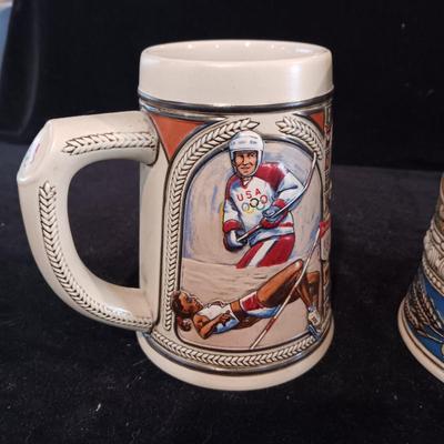 4 BEER STEINS
