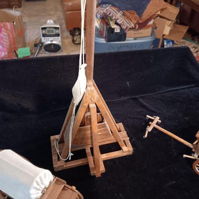 2 DECORATIVE COVERED WAGONS AND A TREBUCHET?