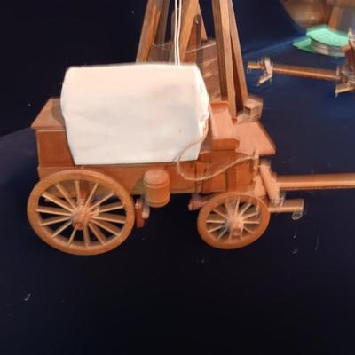 2 DECORATIVE COVERED WAGONS AND A TREBUCHET?