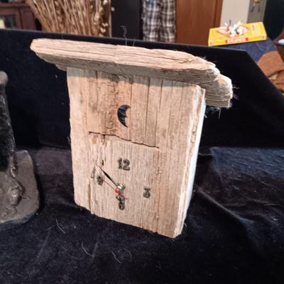 RED DOG SALOON STATUE, METAL COVERED WAGON COIN BANK AND OUTHOUSE CLOCK