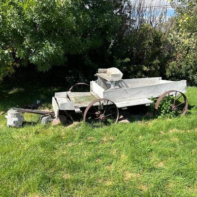 ANTIQUE WOODEN WAGON WITH IRON WHEELS