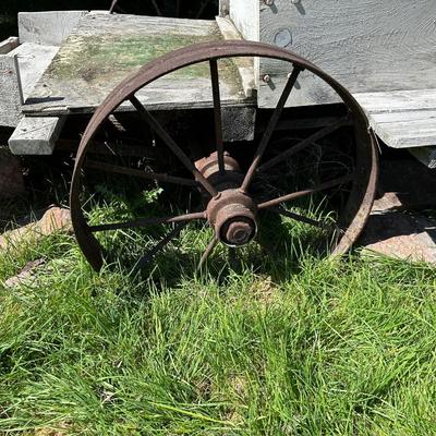 ANTIQUE WOODEN WAGON WITH IRON WHEELS