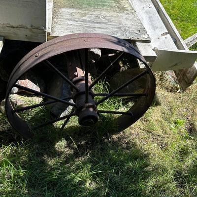 ANTIQUE WOODEN WAGON WITH IRON WHEELS