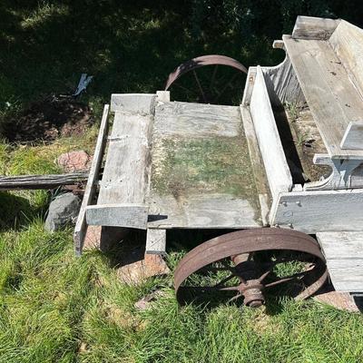 ANTIQUE WOODEN WAGON WITH IRON WHEELS