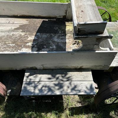 ANTIQUE WOODEN WAGON WITH IRON WHEELS