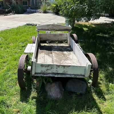 ANTIQUE WOODEN WAGON WITH IRON WHEELS