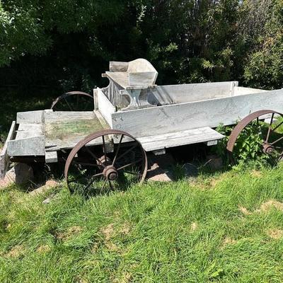 ANTIQUE WOODEN WAGON WITH IRON WHEELS
