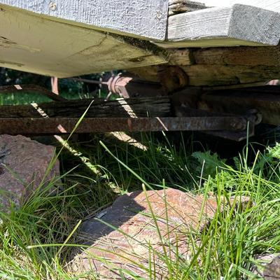 ANTIQUE WOODEN WAGON WITH IRON WHEELS