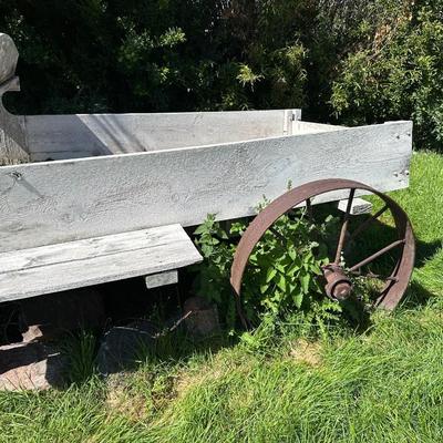 ANTIQUE WOODEN WAGON WITH IRON WHEELS