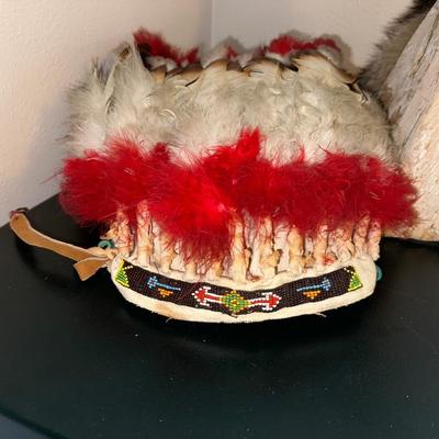 DECORATED BARK TEEPEE AND A HEADDRESS