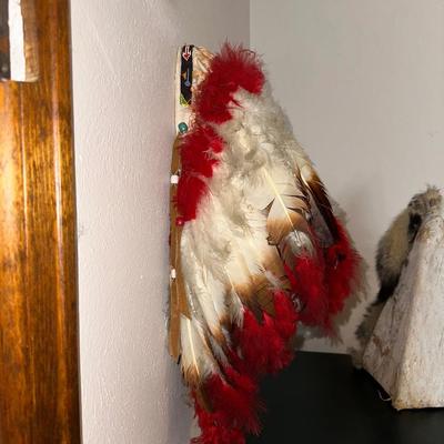 DECORATED BARK TEEPEE AND A HEADDRESS