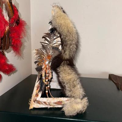 DECORATED BARK TEEPEE AND A HEADDRESS