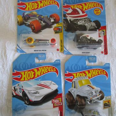 4 Hot Wheels cars