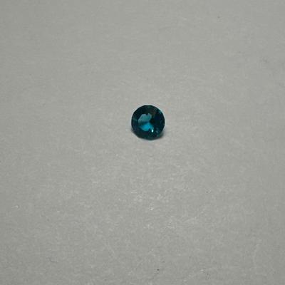 A 925 ring, loose stone, and choir pin