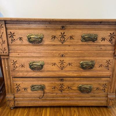 Spoon carved dresser