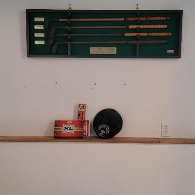 History of golf wall hanging, balls, hat