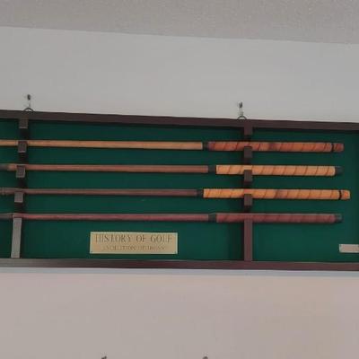 History of golf wall hanging, balls, hat
