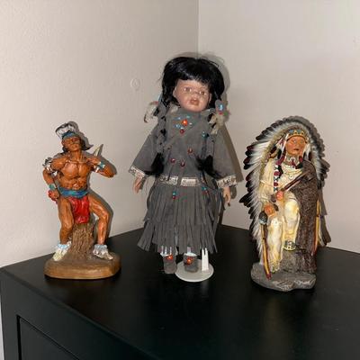 2 NATIVE AMERICAN STATUES WITH A PORCELAIN DOLL
