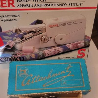 Small Singer hand stitch sewing machine