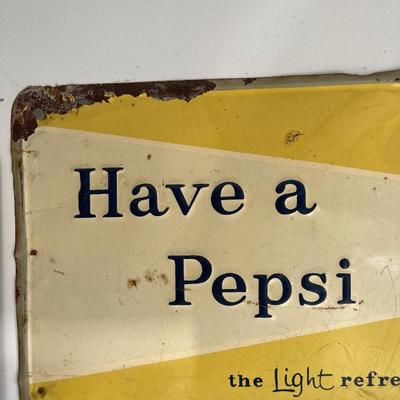 Vintage metal Pepsi & 7-Up signs