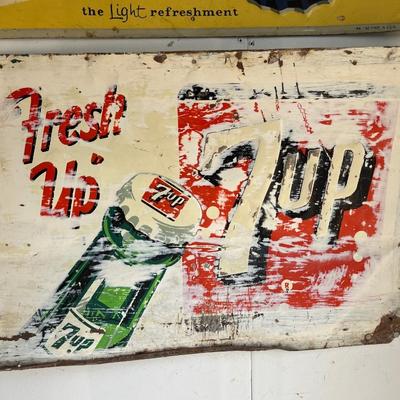 Vintage metal Pepsi & 7-Up signs