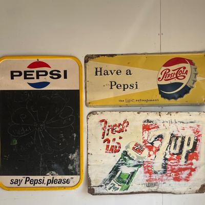 Vintage metal Pepsi & 7-Up signs
