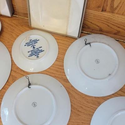 Lot of 7 collectible plates