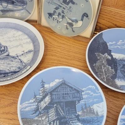 Lot of 7 collectible plates