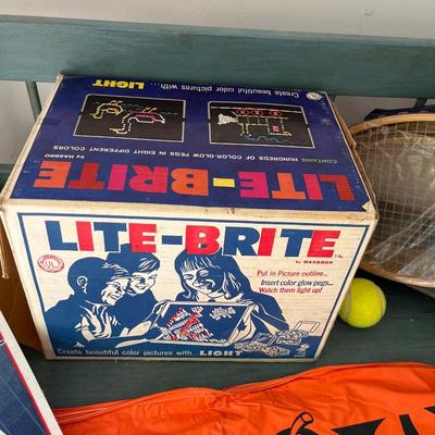 Vintage LiteBrite, Wheaties boxes, badminton set, Minnesota Twins, pennants, and Halloween sign