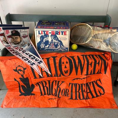 Vintage LiteBrite, Wheaties boxes, badminton set, Minnesota Twins, pennants, and Halloween sign