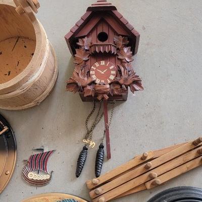 Cuckoo clock, mirror, signs, clock