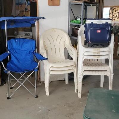 Lot of chairs and cooler