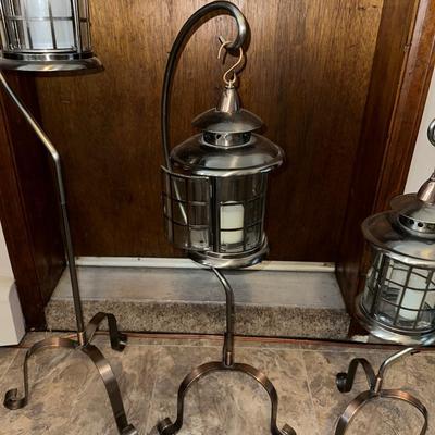 3 FREE STANDING CANDLE LANTERNS