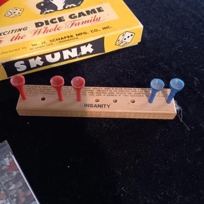 UNASSEMBLED MODEL TRUCK, ELVIS SIGNED BASEBALL, GAME SKUNK AND MORE