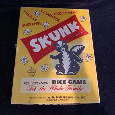 UNASSEMBLED MODEL TRUCK, ELVIS SIGNED BASEBALL, GAME SKUNK AND MORE
