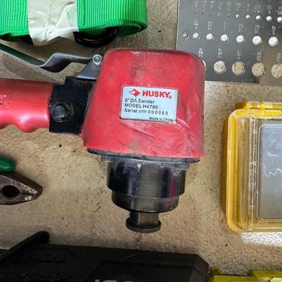 RYOBI 10" CORDLESS CHAINSAW, HUSKY 6" DA AIR SANDER, DRILL BITS AND MORE
