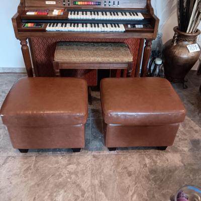 2 MATCHING VINYL OTTOMANS