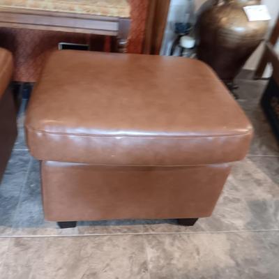 2 MATCHING VINYL OTTOMANS