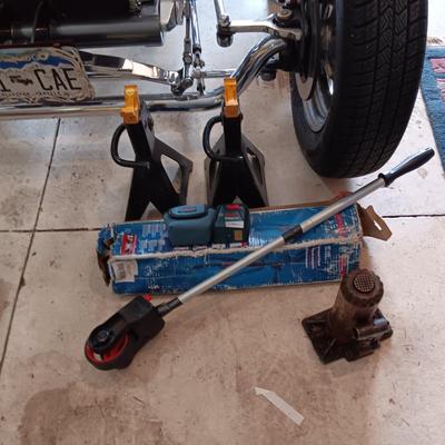 BOSCH LASER LIGHT LEVEL W/TRIPOD, MEASURING WHEEL, JACK STANDS AND MORE
