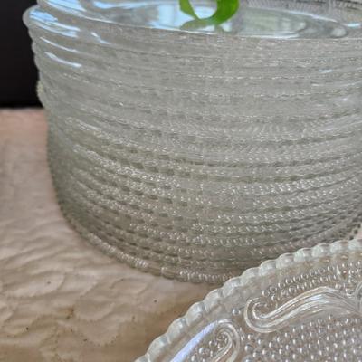 Large Collection of Depression Glass Daisy Plates, Cup, Saucer Bowls