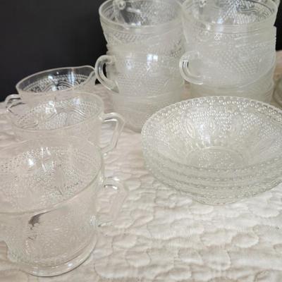Large Collection of Depression Glass Daisy Plates, Cup, Saucer Bowls