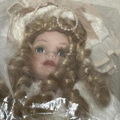 Lot 381 Ceramic Dolls