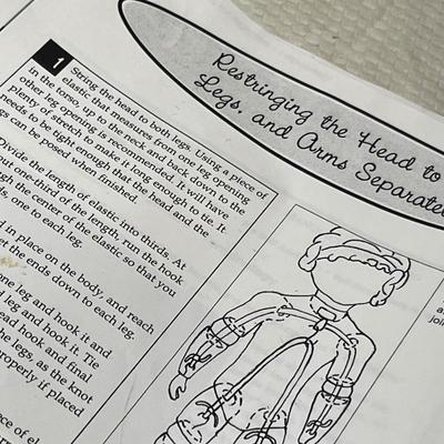 Lot 382 Tub of doll parts and pieces