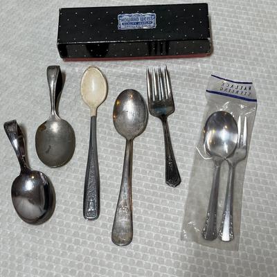Lot 387 Silver Plate baby utensils