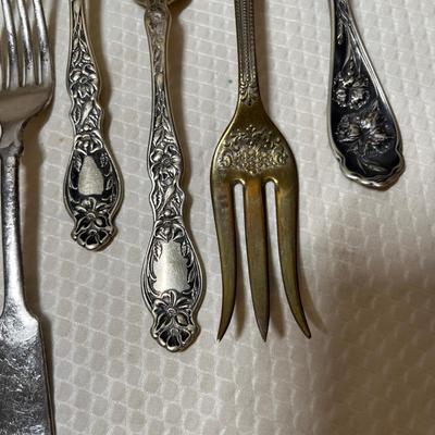Lot 396 Antique Silverplate forks