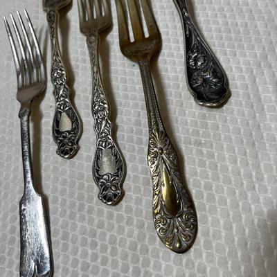 Lot 396 Antique Silverplate forks