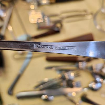 Kitchen Drawer Lot , Knives, forks, Spoons Cutco nutcrackers, Wine openers and more