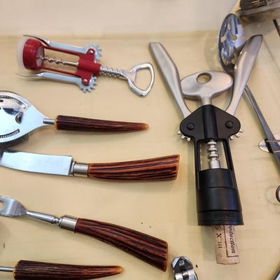 Kitchen Drawer Lot , Knives, forks, Spoons Cutco nutcrackers, Wine openers and more