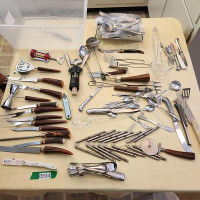 Kitchen Drawer Lot , Knives, forks, Spoons Cutco nutcrackers, Wine openers and more